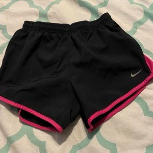 Black with pink Nike shorts